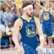  ?? BRANDON DILL/AP ?? Klay Thompson celebrates after the Warriors’ 117-116 win over the Grizzlies on Sunday.