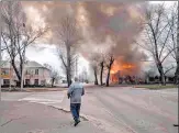  ?? AFP ?? A house on fire following a shelling in Severodone­tsk, Donbass region, Ukraine on Wednesday.