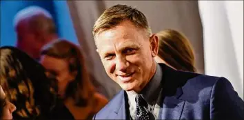  ?? Evan Agostini / Associated Press ?? Daniel Craig’s return to Broadway in a revival of William Shakespear­e’s “Macbeth” is on hold after the actor tested positive for COVID-19.