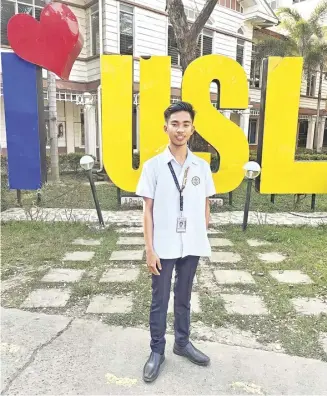  ?? ?? SM Scholar Mark Christian takes Civil Engineerin­g at the University of St. Louis-Tuguegarao.