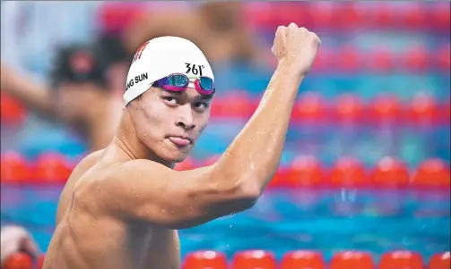  ?? XIA YIFANG / XINHUA ?? China’s Olympic and world champion Sun Yang shoulders the burden to win honors in the upcoming FINA World Championsh­ips in Hungary.