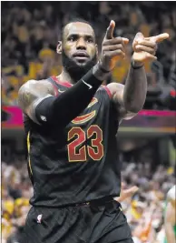  ?? Tony Dejak ?? The Associated Press Cavaliers forward Lebron James reacts to one of his baskets in the first half of Game 4 of the Eastern Conference Finals against the Boston Celtics on Monday in Cleveland.