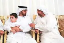  ?? WAM ?? Shaikh Mohammad Bin Zayed with the father of Sultan Mohammad Ali Al Naqbi in Ras Al Khaimah yesterday.