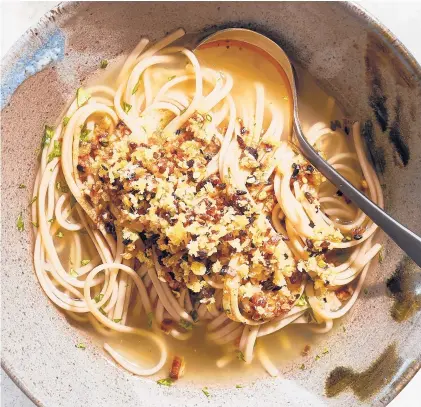  ?? CHRISTOPHE­R SIMPSON/THE NEWYORKTIM­ES ?? Soba noodles with ginger broth and crunchy ginger is a quick-to-prepare dish that is especially sustaining.