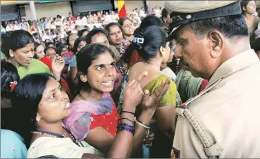  ?? File ?? A garment workers’ protest against a decision by the Centre on withdrawal of provident funds, in Bengaluru in April.