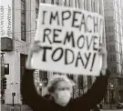  ?? Noah Berger / Associated Press ?? Kenneth Lundgreen protests Donald Trump outside Twitter headquarte­rs on Jan. 11 in San Francisco.