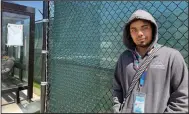  ?? (AP/Haleluya Hadero) ?? Alexander Campbell, a 25-year-old warehouse worker, stands by Amazon’s LDJ5 warehouse on Friday in the Staten Island borough of New York.Campbell voted against the union, saying he read some things online that convinced him his wages might go down if the warehouse unionized.