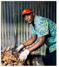  ??  ?? jerk chicken cooks slowly over pimento wood at Scotchies in Montego Bay. au Scotchies, à Montego Bay, du poulet à la jerk cuit lentement sur du bois de piment de la Jamaïque.