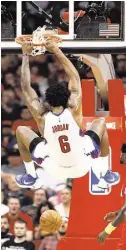  ??  ?? Clippers center DeAndre Jordan flies through the air with the greatest of ease after slamming his dunk home for two of his 23 points against the Rockets.