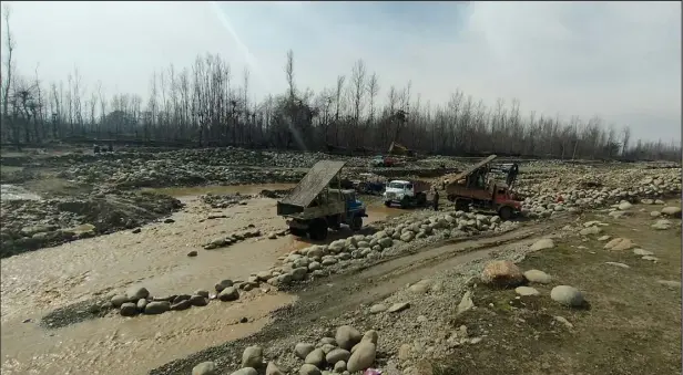  ?? Picture Credits: Raja Muzaffar Bhat for KO ?? In Picture: Shali Ganga after mining.