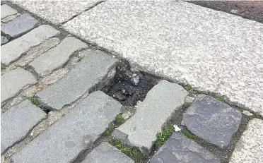  ?? ?? The Gazette visited the site near Canterbury Cathedral to find the cobbleston­e missing