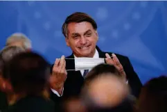  ??  ?? Bolsonaro has been heavily criticised for his role in Brazil’s slow vaccine rollout (Reuters)