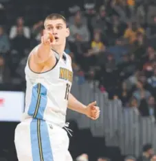  ?? John Leyba, The Denver Post ?? Led by Nikola Jokic, a 22-year-old center, the Nuggets appear to be pointed in the right direction.