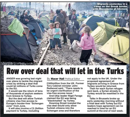  ??  ?? Migrants yesterday in a camp on the Greek border with Macedonia at Idomeni