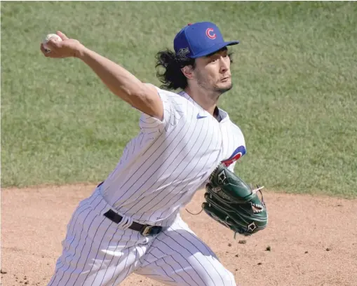  ?? NAM Y. HUH/AP ?? The Cubs’ Yu Darvish led the National League in victories and was second to the Reds’ Trevor Bauer in ERA during the pandemic-shortened season.