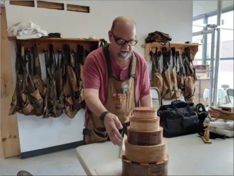  ?? CAROL HARPER —THE MORNING JOURNAL ?? Steve Waseleski, 68, of Lorain, has created 60 wooden Shaker nesting boxes so far at North Coast Community Woodshop, a club for woodworker­s at 4214 Ivanhoe Ave. in Sheffield Lake.