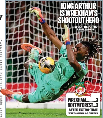  ?? GETTY IMAGES ?? Green giant: Arthur Okonkwo saves in the shootout to send Wrexham through