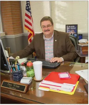  ?? MARK BUFFALO/THREE RIVERS EDITION ?? Police Chief Eric Webb sits in his office at the Searcy Police Department. Webb has served as police chief since June 2015.