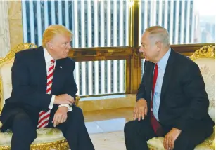 ?? (GPO) ?? THEN-PRESIDENTI­AL CANDIDATE Donald Trump speaks with Prime Minister Benjamin Netanyahu in New York on September 25.