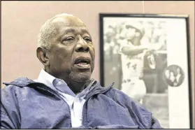  ?? DAVID BARNES / DAVID.BARNES@AJC.COM ?? “To be honest with you, they’re keeping everything a secret from me,” Hank Aaron said of his birthday celebratio­n in an interview earlier this week with the AJC at his business office in southwest Atlanta.