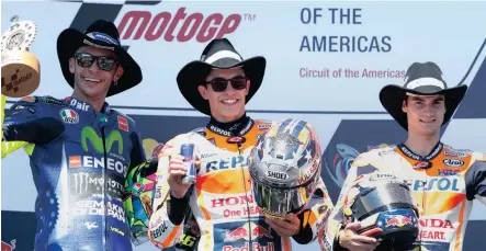  ??  ?? Valentino Rossi (Left), Marc Marquez (centre) and Dani Pedrosa (right) shared the Austin podium.