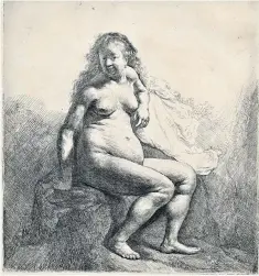  ??  ?? Extraordin­ary fidelity: Naked Woman Seated on a Mound in the Norwich Castle exhibition’s final section, devoted to nudes, perfectly illustrate­s Rembrandt’s frank gaze upon the human form