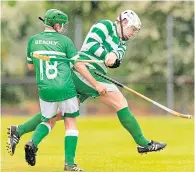  ??  ?? In the thick of it: Robert MacIntyre in action for Oban Celtic against Beauly at Mossfield