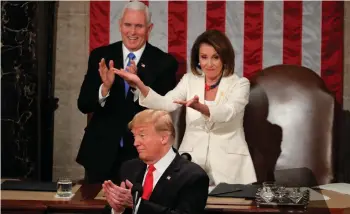  ?? (Doug Mills, Jim Young/Reuters) ?? PRESIDENT DONALD TRUMP delivers the State of the Union address, alongside Vice President Mike Pence and Speaker of the House Nancy Pelosi. Trump honored Tree of Life massacre survivor Judah Samet (bottom right) and police officer Timothy Matson (top right), who was shot while chasing the assailant.