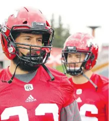  ?? JIM WELLS ?? William Langlais and Charlie Power are among the hopefuls auditionin­g for a role as the Calgary Stampeders’ starting fullback, which was vacated after the retirement of Rob Cote.