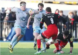  ??  ?? Loose cannon: Paul Hill attacks for Saints against Saracens