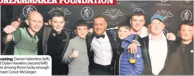  ??  ?? Amazing Darren Valentine (left) and Dylan Hawkins (second left) were among those lucky enough to meet Conor Mcgregor