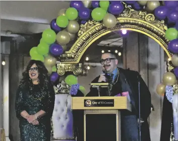  ?? ELIZABETH MAYORAL CORPUS PHOTO ?? RIGHT TO LEFT: El Centro Mardi Gras 2023 Coronation Masters of Ceremonies, Interim City Manager Cedric Ceseña and El Centro Mayor Martha Cardenas-Singh speak on the meaning and legacy of Mardi Gras during a coronation event, held Thursday, February 16, in El Centro.