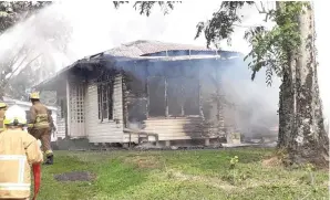  ?? Photo: Inoke Rabonu ?? Firefighte­rs try to contain the fire at Statham Street in Vatuwaqa on July 26, 2020.