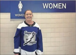  ?? Tampa Bay Times/TNS - Mari Faiello ?? Becky McKeen, a Tampa Bay Lightning fan known as “Bathroom Becky,” stands outside of a bathroom at Amalie Arena.