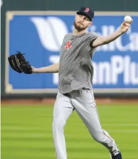  ?? AP ?? Red Sox ace Chris Sale, who still is recovering from a stomach illness, threw in the outfield for 10-15 minutes before Game 4 but didn’t throw a bullpen session.