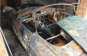  ??  ?? Arson: The car was nearly totally destroyed by vandals during a break-in