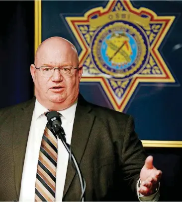  ?? [PHOTO BY NATE BILLINGS, THE OKLAHOMAN ARCHIVES] ?? OSBI Director Stan Florence speaks during a press conference in 2015.