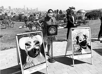  ?? HAVEN DALEY/AP ?? San Francisco Mayor London Breed, center, on Friday warns the public to be diligent in wearing masks and socially distancing over the holiday weekend.