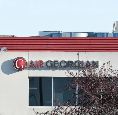  ?? PETER J THOMPSON/NATIONAL POST/FILES ?? Despite Air Georgian losing a 1.5-million passenger contract with Air Canada, the regional carrier says it does not expect the loss of the deal to negatively impact its long-term business growth.