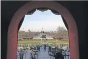  ?? WIN MCNAMEE/POOL VIA AP ?? This photo shows a view from the lower west terrace door as preparatio­ns are made prior to a dress rehearsal for the 59th inaugural ceremony for President-elect Joe Biden and Vice President-elect Kamala Harris on Monday at the U.S. Capitol in Washington.