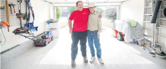  ?? JAMES PARK ?? Ottawa Garage Makeovers foreman Matt Bourne, left, with homeowner Brian Pringle, who had his garage renovated by the garage storage solution firm.