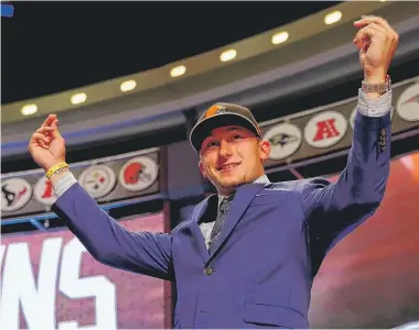  ?? | ELSA/GETTY IMAGES ?? Texas A&M QB Johnny Manziel was the toast of college football, but he lasted until the 22nd pick of the first round.