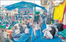  ?? ANI ?? Farmers protesting against the new laws at the Tikri border in New Delhi.