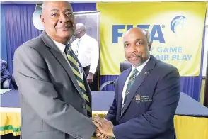  ?? PHOTO BY MARC STAMP ?? Jamaica Football Federation president Michael Ricketts (left) and Jamaica Olympic Associatio­n president Christophe­r Samuda at yesterday’s press briefing to announce a partnershi­p aimed at the qualificat­ion of football for the 2020 Olympic Games.