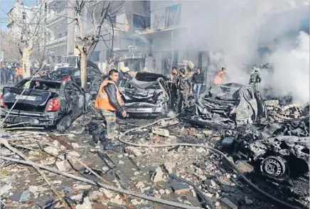  ?? Photo: REUTERS ?? Islamists blamed: Syrian security officials inspect the site of an explosion in Damascus in this photo distribute­d by the Sana, Syria’s official news agency.