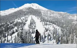  ?? Allen J. Schaben Los Angeles Times ?? BOB GULLIXSON takes in the snowy scenery at Mt. Shasta. A wet March had raised the hopes of farmers denied their usual allotment of federal water.