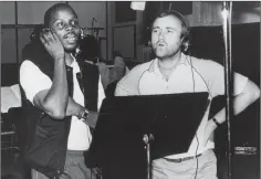  ??  ?? Philip Bailey and Phil Collins in the studio.