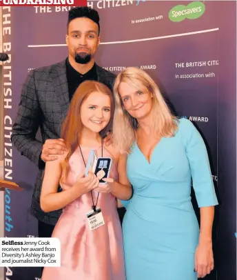  ??  ?? Selfless Jenny Cook receives her award from Diversity’s Ashley Banjo and journalist Nicky Cox