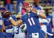  ?? JOHN RAOUX / AP ?? Florida quarterbac­k Kyle Trask leads the country with 43 touchdownp­asses and 4,125 yards and is vying to become the fourthGato­r signal-caller to win the Heisman.