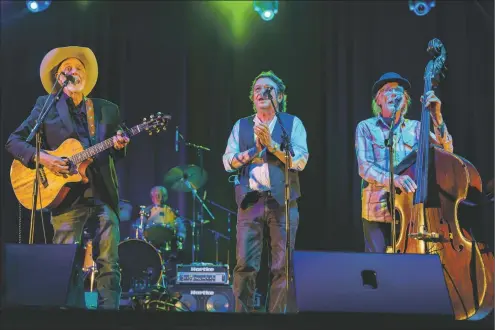  ??  ?? Michael Hearne and Friends perform the closing act at the Big Barn Dance on Saturday (Sept. 11) in Kit Carson Park, concluding the music festival that draws large crowds from Taos and surroundin­g areas.